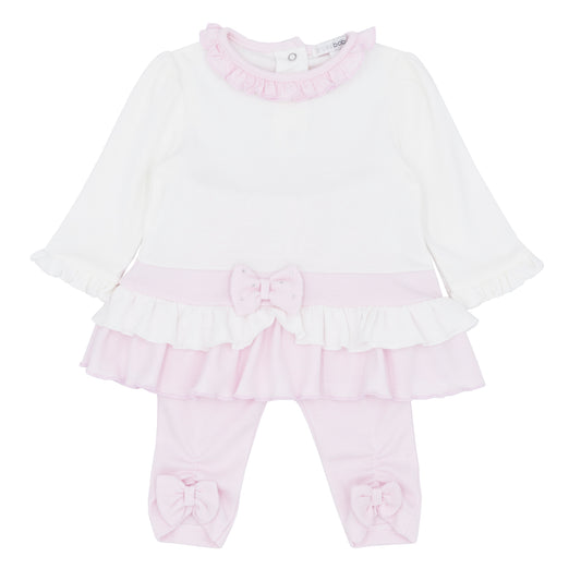 Baby outfit with white top and pink pants on a white background